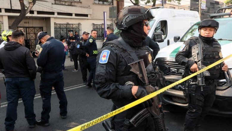 Mexico City mayor’s personal secretary and adviser shot dead in the street by gunmen on motorcycle