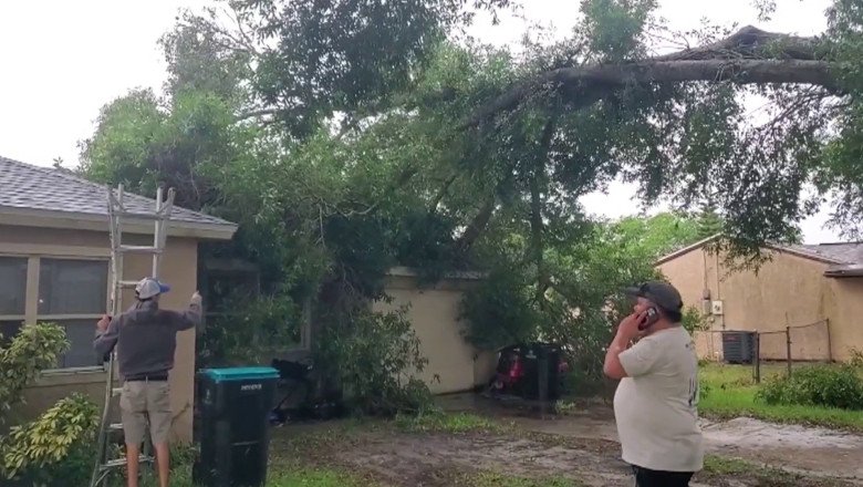 Storms send tree onto Palm Bay home; hail reported across Central Florida