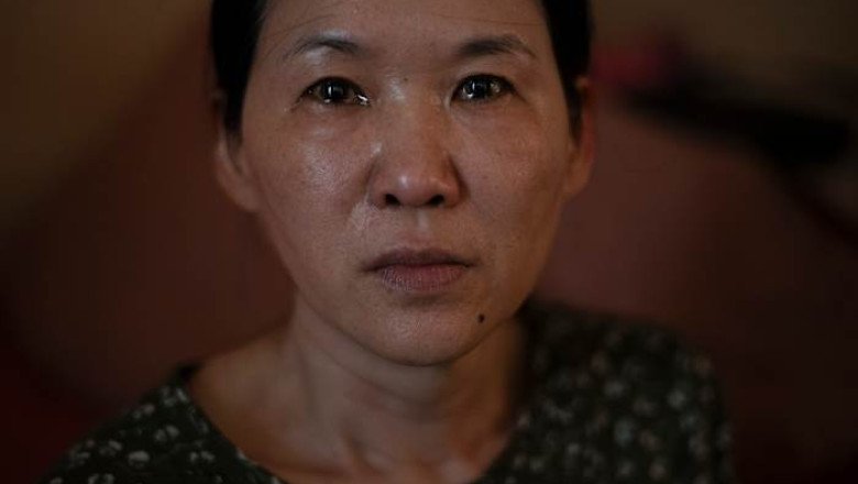 A South Korean mother sues the government and an agency over the adoption of her missing son