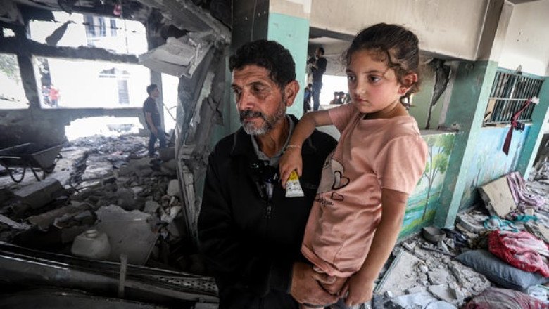 Tiny girl who emerged from flames of Israeli strike on Gaza school-turned-shelter says “fire filled the sky”