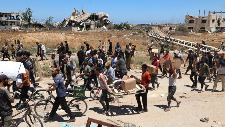 Israeli attacks kill dozens in Gaza as more gunfire reported near US aid centre