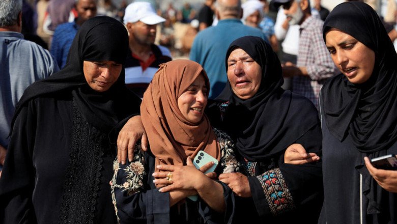 At least 27 Palestinians killed while waiting for aid distribution, medics say