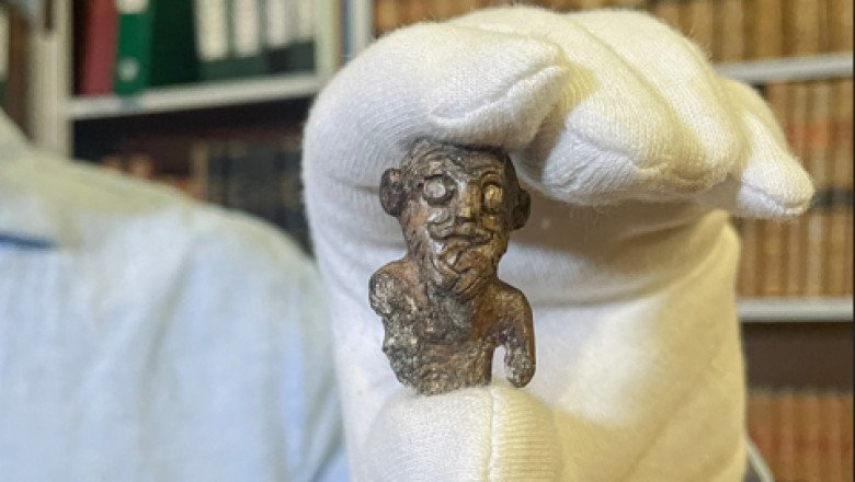 Smiling miniature figurine thought to be first Viking “portrait” unveiled in Denmark