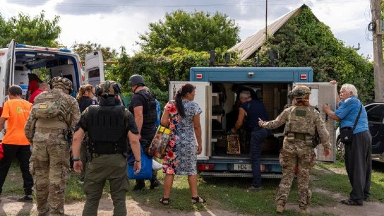 “Brutally savage” Russian strike kills at least 20 in east Ukraine as pensions were handed out, Zelenskyy says