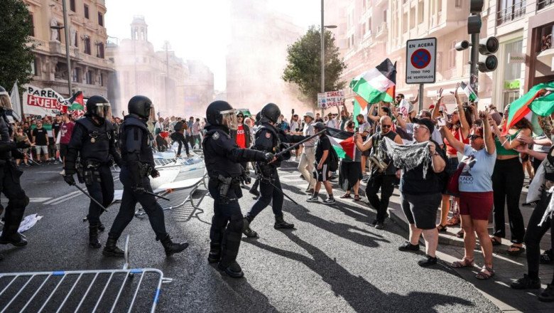 Final stage of Spain's Vuelta abandoned after police clash with pro-Palestinian protesters