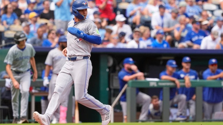 Blue Jays secure playoff spot with 8-5 win against Royals